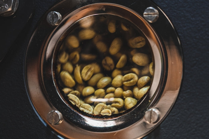 close-up-light-roasted-colombian-coffee-beans-inside-roasting-machine