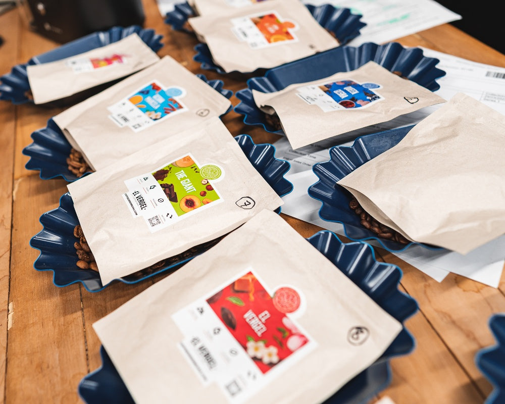A collection of specialty coffee beans from El Vergel on coffee tasting station