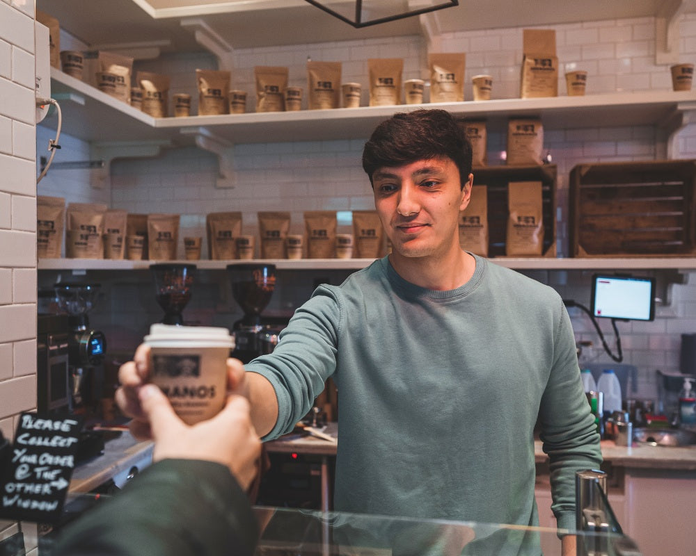 Customer buying Colombian specialty coffee beans