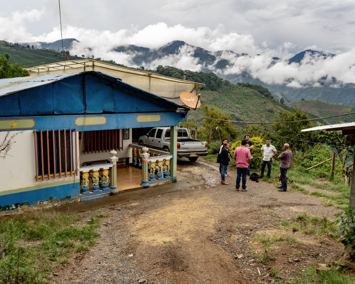 A farm within the Colombian coffee triangle amidst steep mountainous landscape